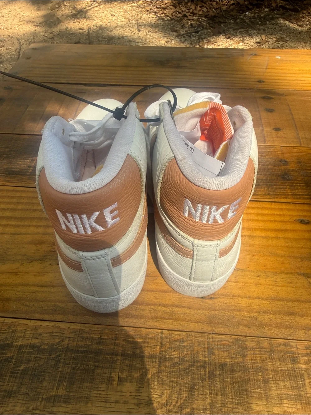 Nike Women's High-Top Sneakers White with Peach Swoosh